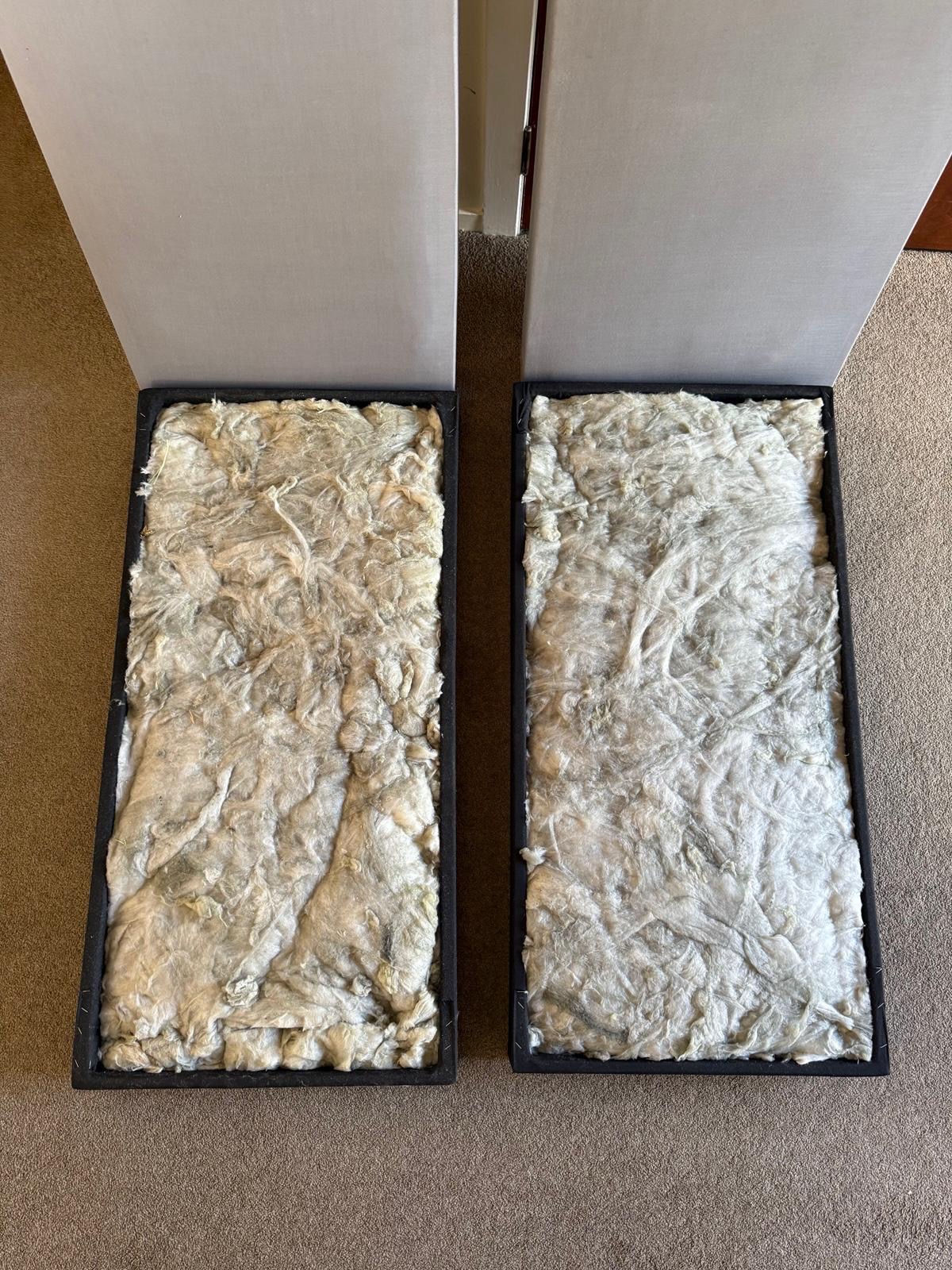 Dense mineral wool infill packed inside a panel frame